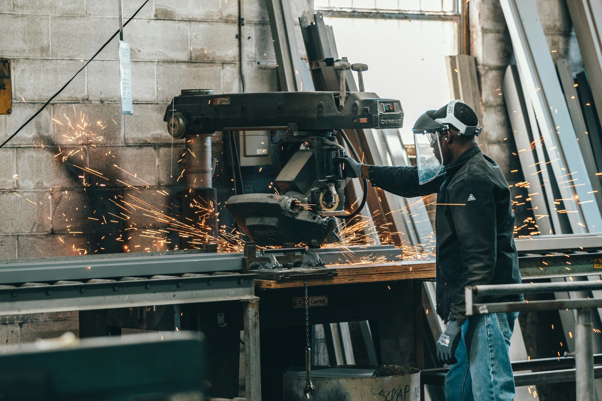 Metal fabricator cutting steel